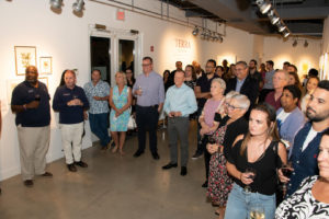 HE Governor Martyn Roper and guests at exhibition opening